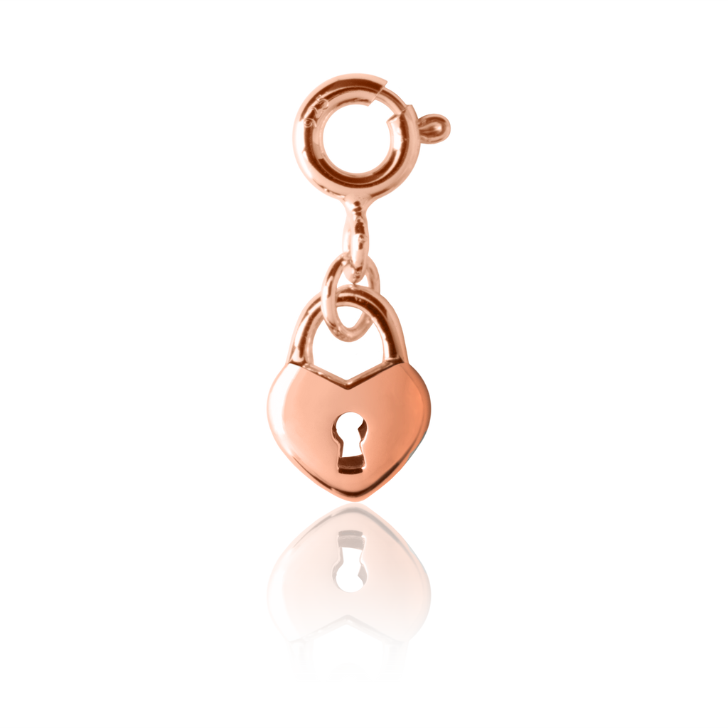 childrens heart charm in rose gold with a lock symbol in the centre